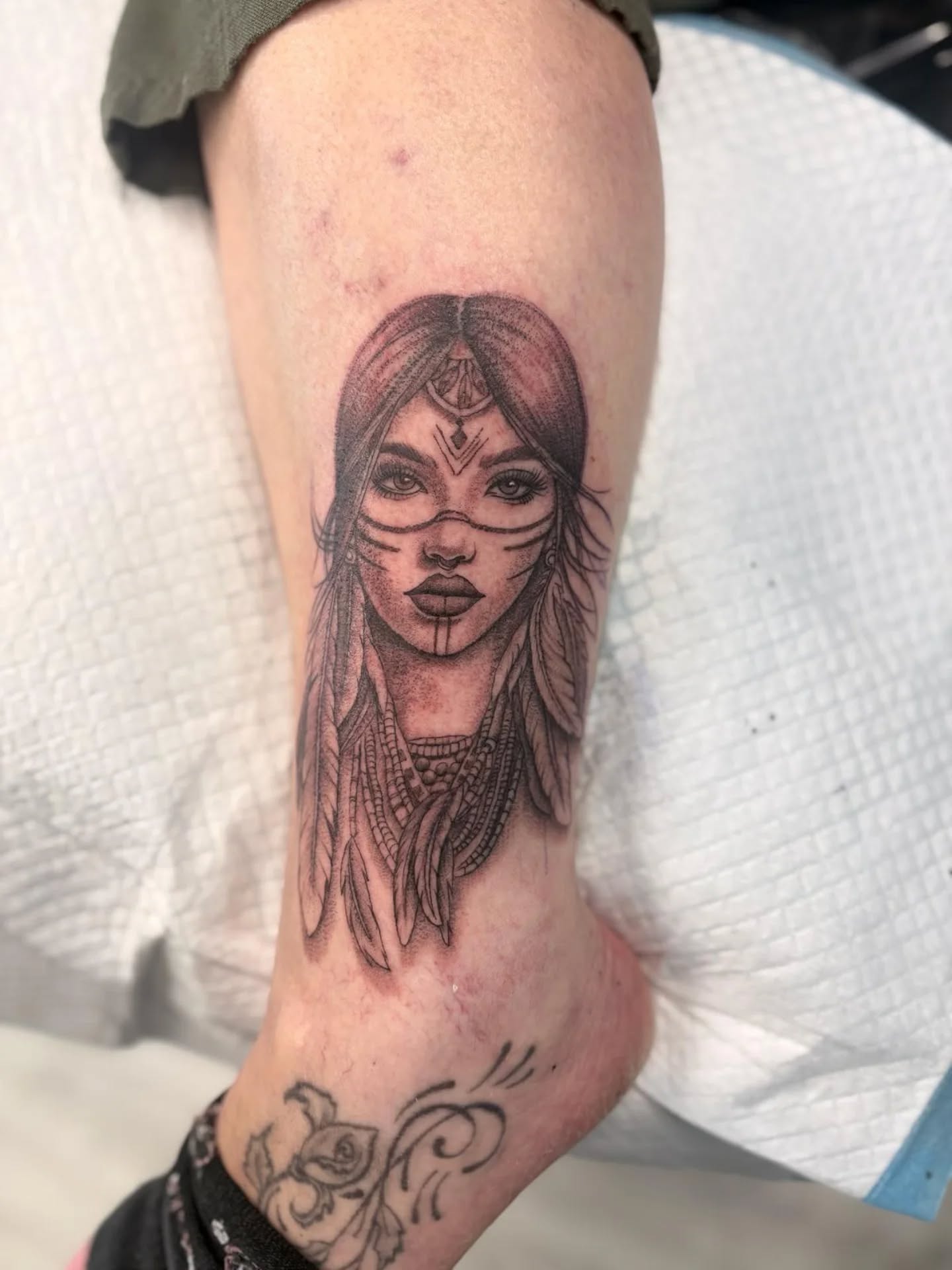 Fine line female portrait tattoo